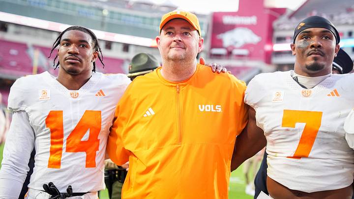 Tennessee defensive back Kayin Lee (14), Tennessee coach Josh Heupel and Tennessee linebacker Arion Carter (7) after a college football game between Tennessee and Arkansas at Donald W. Reynolds Razorback Stadium in Fayetteville, Ark., on Oct. 10, 2026.