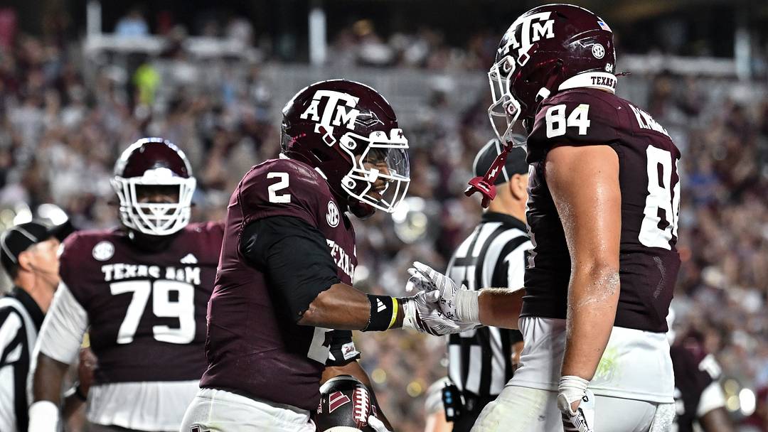 Sep 5, 2026; College Station, Texas, USA; Texas A&M Aggies running back Jamarion Morrow (2) celebrates after scoring a touchdown with tight end Richie Anderson III (84) during third quarter against the Missouri State Bears at Kyle Field. Mandatory Credit: Maria Lysaker-Imagn Images
