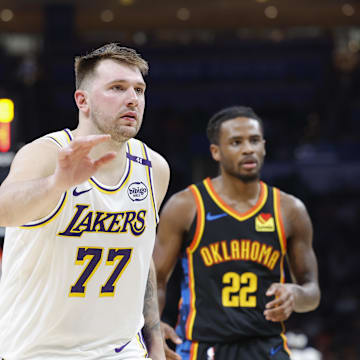 Apr 6, 2025; Oklahoma City, Oklahoma, USA; Los Angeles Lakers guard Luka Doncic (77) runs down the court during the second half against the Oklahoma City Thunder at Paycom Center. Mandatory Credit: Alonzo Adams-Imagn Images