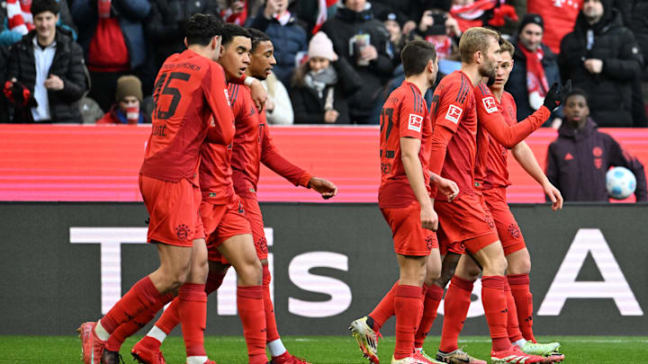 Bayern Munich players celebrating against Holstein Kiel on Saturday.