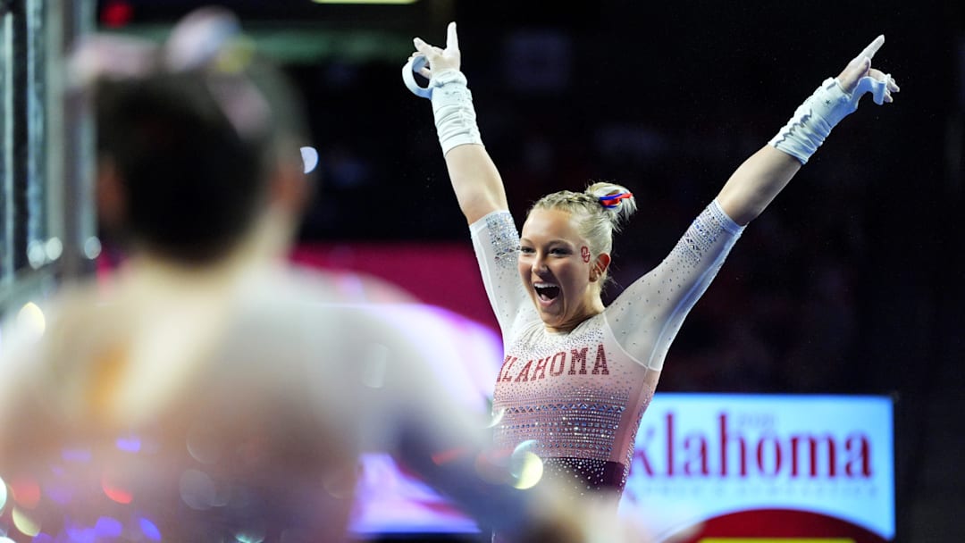 Oklahoma's Ella Murphy celebrates after the bars during the SEC Women's gymnastics meet between the University of Oklahoma Sooners and the Alabama Crimson Tide at the Lloyd Noble Center in Norman, Okla., Friday Feb. 6, 2026.