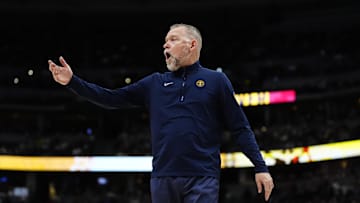 Apr 6, 2025; Denver, Colorado, USA; Denver Nuggets head coach Michael Malone reacts in the second half against the Indiana Pacers at Ball Arena. Mandatory Credit: Ron Chenoy-Imagn Images