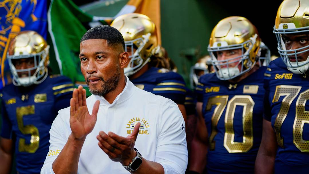 Notre Dame head coach Marcus Freeman waits to take the field with his team before a game against Wisconsin on Sunday, Sept. 6, 2026, at Lambeau Field in Green Bay, Wisconsin. Notre Dame won the game, 41-13 Notre Dame head coach Marcus Freeman waits to take the field with his team before a game against Wisconsin on Sunday, Sept. 6, 2026, at Lambeau Field in Green Bay, Wisconsin. Notre Dame won the game, 41-13