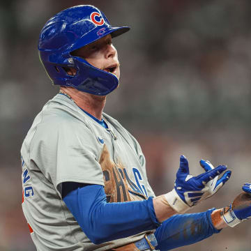 May 15, 2024; Cumberland, Georgia, USA; Chicago Cubs center fielder Pete Crow-Armstrong (52) reacts after hitting a triple against the Atlanta Braves during the eight inning at Truist Park.