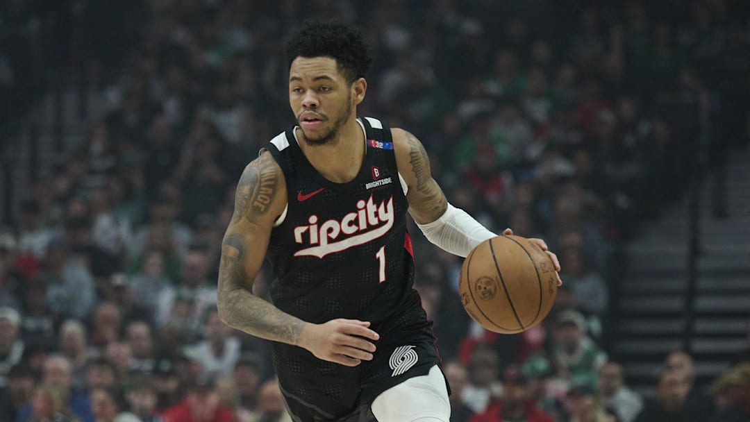 Mar 23, 2025; Portland, Oregon, USA; Portland Trail Blazers guard Anfernee Simons (1) dribbles the ball during the first half against the Boston Celtics at Moda Center. Mandatory Credit: Troy Wayrynen-Imagn Images Mar 23, 2025; Portland, Oregon, USA; Portland Trail Blazers guard Anfernee Simons (1) dribbles the ball during the first half against the Boston Celtics at Moda Center. Mandatory Credit: Troy Wayrynen-Imagn Images