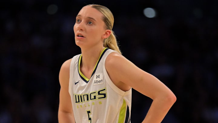 Sep 7, 2025; Los Angeles, California, USA;  Dallas Wings guard Paige Bueckers (5) looks on during the first half against the Los Angeles Sparks at Crypto.com Arena. Mandatory Credit: Jayne Kamin-Oncea-Imagn Images
