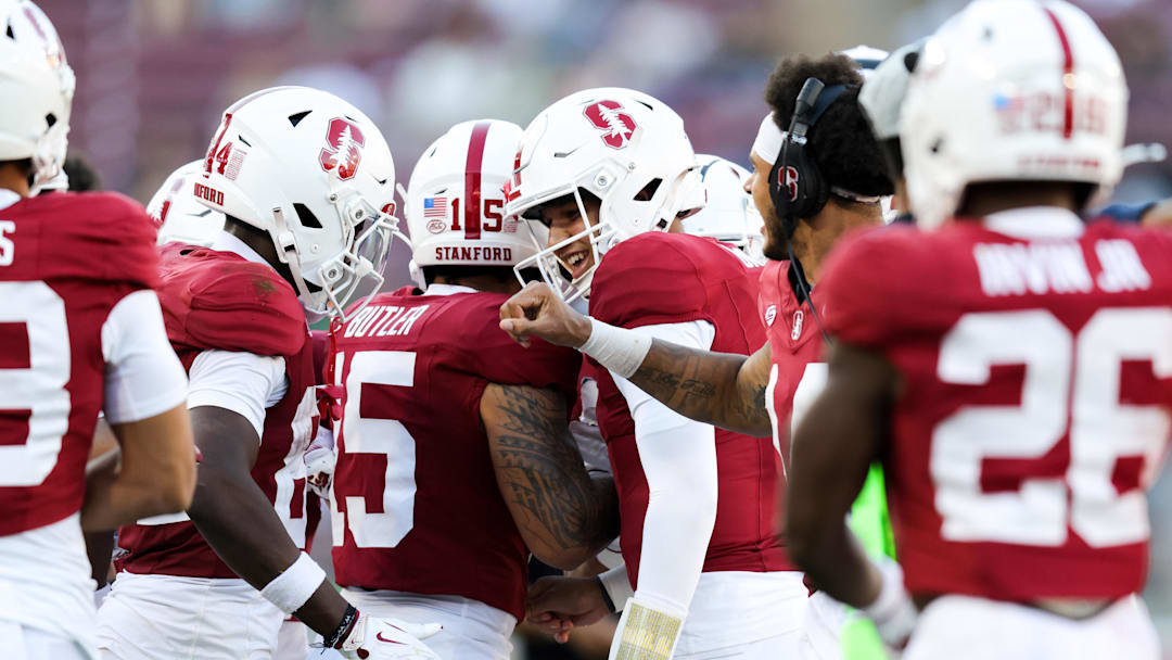 Sep 7, 2024; Stanford, California, USA; Stanford Cardinal quarterback Elijah Brown (2) celebrates with teammates after a touchdown against the Cal Poly Mustangs during the second half at Stanford Stadium. Mandatory Credit: Sergio Estrada-Imagn Images