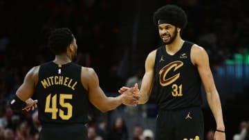 Apr 10, 2024; Cleveland, Ohio, USA; Cleveland Cavaliers guard Donovan Mitchell (45) and center Jarrett Allen (31) celebrate during the second half against the Memphis Grizzlies at Rocket Mortgage FieldHouse. Mandatory Credit: Ken Blaze-USA TODAY Sports