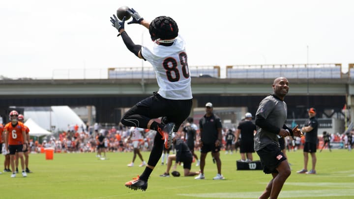 Jul 26, 2024; Cincinnati, OH, USA; Cincinnati Bengals tight end Mike Gesicki (88) completes a catch in the end zone during training camp practice at Kettering Health Practice Fields. Mandatory Credit: Kareem Elgazzar-USA TODAY Sports