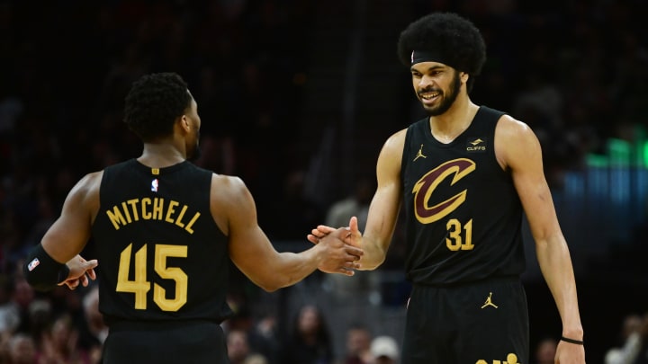 Apr 10, 2024; Cleveland, Ohio, USA; Cleveland Cavaliers guard Donovan Mitchell (45) and center Jarrett Allen (31) celebrate during the second half against the Memphis Grizzlies at Rocket Mortgage FieldHouse. Mandatory Credit: Ken Blaze-USA TODAY Sports