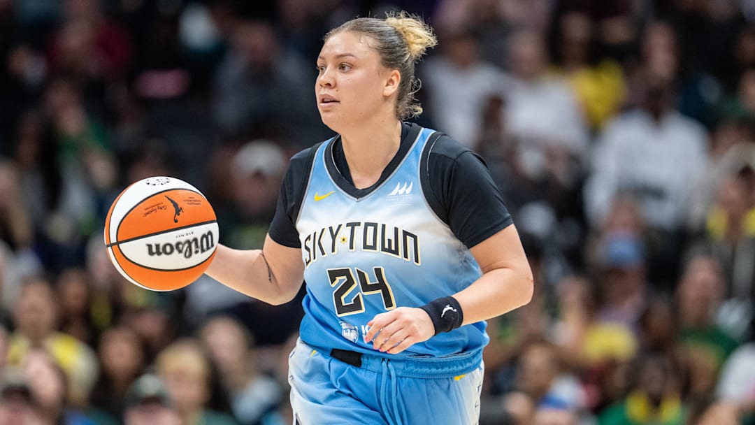 Aug 30, 2025; Seattle, Washington, USA; Chicago Sky guard Rachel Banham (24) dribbles the ball against the Seattle Storm at Climate Pledge Arena. Mandatory Credit: Stephen Brashear-Imagn Images