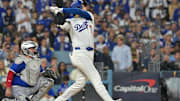Oct 27, 2025; Los Angeles, California, USA; Los Angeles Dodgers two-way player Shohei Ohtani (17) hits a solo home run against the Toronto Blue Jays in the seventh inning during game three of the 2025 MLB World Series at Dodger Stadium.