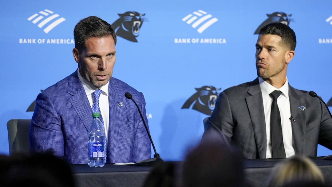 Carolina Panthers general manager Dan Morgan (left) speaks with new coach Dave Canales 