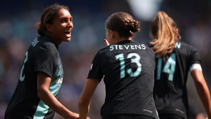 Aug 24, 2024; Harrison, New Jersey, USA; NJ/NY Gotham FC forward Ella Stevens (13) celebrates with defender Jess Carter (27) after scoring a goal against Portland Thorns FC during the first half at Red Bull Arena. Mandatory Credit: Vincent Carchietta-USA TODAY Sports