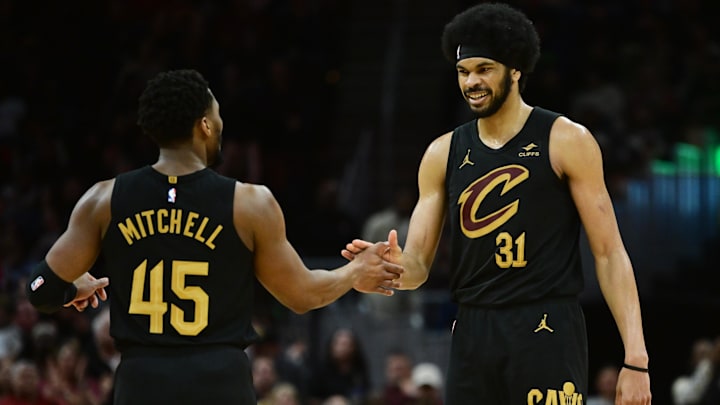 Apr 10, 2024; Cleveland, Ohio, USA; Cleveland Cavaliers guard Donovan Mitchell (45) and center Jarrett Allen (31) celebrate during the second half against the Memphis Grizzlies at Rocket Mortgage FieldHouse. Mandatory Credit: Ken Blaze-Imagn Images