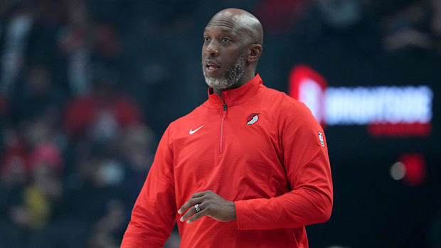 Trail Blazers head coach Chauncey Billups watches from the sideline.