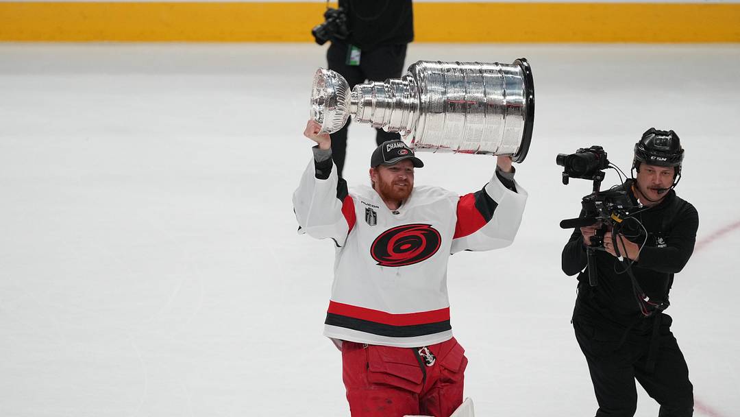 Jun 14, 2026; Las Vegas, Nevada, USA;  Carolina Hurricanes goaltender Frederik Andersen (31) celebrates with the Stanley Cup after the win against the Vegas Golden Knights in game six of the 2026 Stanley Cup Final at T-Mobile Arena. Mandatory Credit: Lucas Peltier-Imagn Images