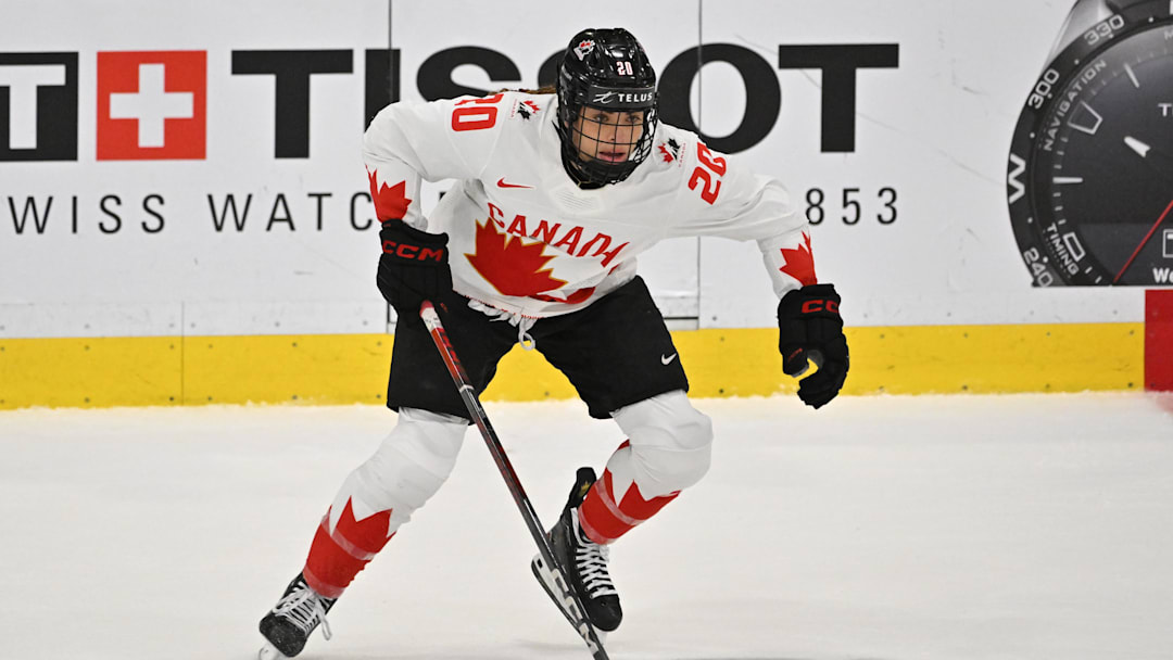 Apr 15, 2023; Brampton, Ontario, CAN;   Canada forward Sarah Nurse (20) skates with the puck against Switzerland in the first period at CAA Center. Mandatory Credit: Dan Hamilton-Imagn Images