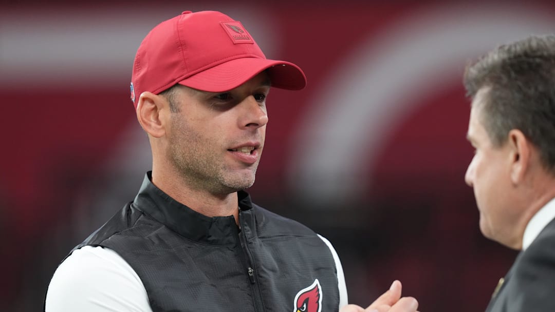 Arizona Cardinals head coach Jonathan Gannon embraces team owner Michael Bidwill before the team plays the Jacksonville Jaguars at State Farm Stadium on Nov. 23, 2025.