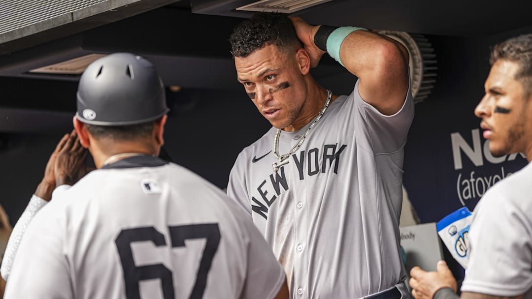 Jul 20, 2025; Cumberland, Georgia, USA; New York Yankees right fielder Aaron Judge (99) shown in the dugout during the game against the Atlanta Braves during the eighth inning at Truist Park. Mandatory Credit: Dale Zanine-Imagn Images