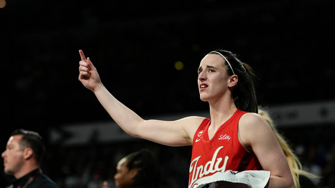 Oct 1, 2026; Las Vegas, Nevada, USA;  Indiana Fever guard Caitlin Clark (22) walks off the court bleeding during the fourth quarter of game three of the first round for the 2026 WNBA Playoffs against the Las Vegas Aces at Michelob Ultra Arena.  Mandatory Credit: Lucas Peltier-Imagn Images