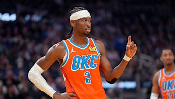 Oklahoma City Thunder guard Shai Gilgeous-Alexander looks towards the team bench during a break in the action against the Golden State Warriors in the first quarter at the Chase Center.