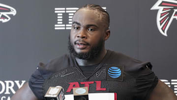 Jul 25, 2024; Buford, GA, USA; Atlanta Falcons defensive end Grady Jarrett (97) talks to the media on the first day of training camp at Falcons Training Camp. Mandatory Credit: Dale Zanine-Imagn Images