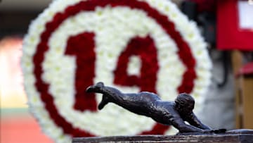 A miniture Pete Rose statue sits at a table George Foster at Great American Ball Park during the Cincinnati Red’s Pete Rose night at the ballpark on Wednesday, May 14, 2025 in Cincinnati.