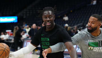 Mar 7, 2024; Denver, Colorado, USA; Boston Celtics guard Jrue Holiday (4) and assistant coach Charles Lee before the game against the Denver Nuggets at Ball Arena. Mandatory Credit: Ron Chenoy-USA TODAY Sports