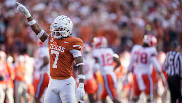 Texas Longhorns defensive back Jahdae Barron (7) celebrates a turnover against Clemson Tigers in the first half of an NCAA College Football Playoffs first round game at Darrell K Royal Texas Memorial Stadium, Austin, Texas, Saturday, Dec. 21, 2024.