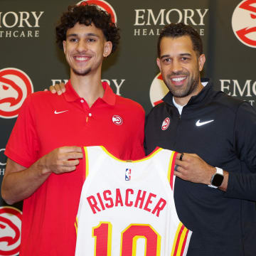 Jun 28, 2024; Atlanta, Georgia, USA; Atlanta Hawks first overall draft pick Zaccharie Risacher poses for a photo with general manager Landry Fields at the Emory Sports Medicine Complex. Mandatory Credit: Brett Davis-USA TODAY Sports