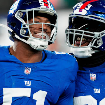 New York Giants linebacker Azeez Ojulari (51), New York Giants defensive tackle Rakeem Nunez-Roches (93) and the rest of Big Blue were all smiles as they beat the Philadelphia Eagles, 27-10, Sunday, January 7, 2024.