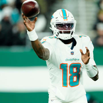 Miami Dolphins quarterback Tyler Huntley (18) passes the ball in the first half, Sunday, January 5, 2025, in East Rutherford.