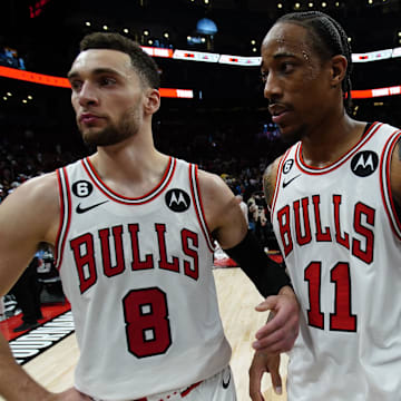 Apr 12, 2023; Toronto, Ontario, CAN; Chicago Bulls guard Zach LaVine (8) and forward DeMar DeRozan (11) come off the court after a win over the Toronto Raptors in NBA Play-In game 3 at Scotiabank Arena. Mandatory Credit: John E. Sokolowski-Imagn Images