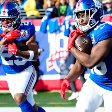 New York Giants running back Devin Singletary (26) and New York Giants running back Tyrone Tracy Jr. (29) prepare for the game, Sunday, December 8, 2024, in East Rutherford.