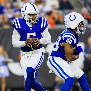 Indianapolis Colts quarterback Anthony Richardson (5) runs with the ball against the Cincinnati Bengals in the first half at Paycor Stadium.