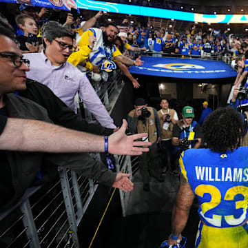 Los Angeles Rams running back Kyren Williams (23) walks off the field after their 27-9 playoff win over the Minnesota Vikings at State Farm Stadium on Jan. 13, 2025, in Glendale.