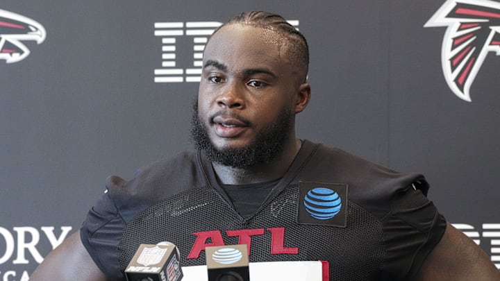 Jul 25, 2024; Buford, GA, USA; Atlanta Falcons defensive end Grady Jarrett (97) talks to the media on the first day of training camp at Falcons Training Camp. Mandatory Credit: Dale Zanine-Imagn Images