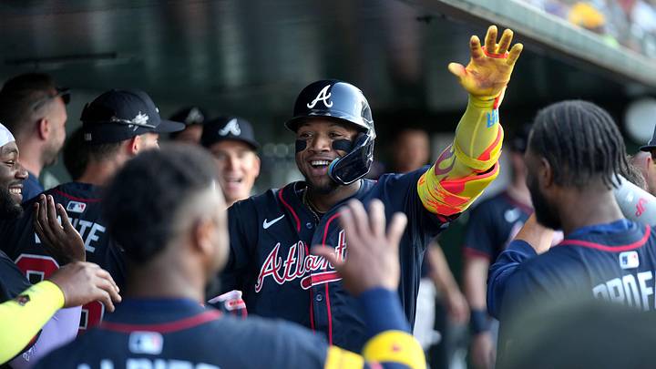 Jul 9, 2025; West Sacramento, California, USA; Atlanta Braves right fielder Ronald Acuna Jr. (13) is congratulated by teammates after hitting a home run against the Athletics in the fourth inning at Sutter Health Park. Mandatory Credit: Cary Edmondson-Imagn Images
