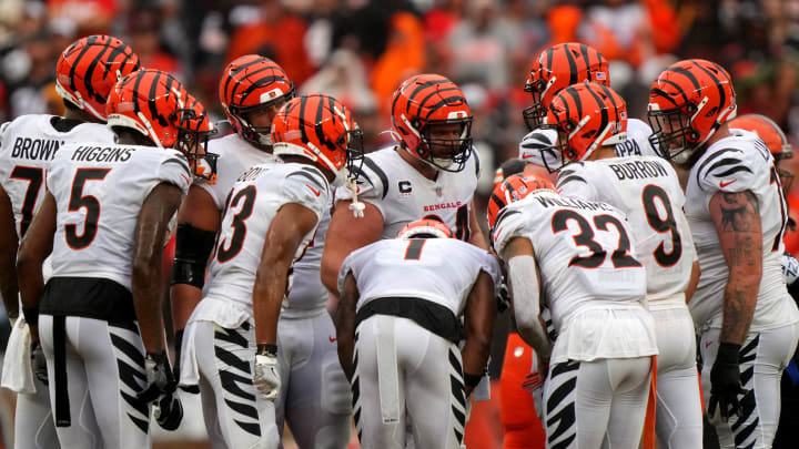 Cincinnati Bengals quarterback Joe Burrow (9) calls a play in the huddle in the first quarter of an NFL football game between the Cincinnati Bengals and Cleveland Browns, Sunday, Sept. 10, 2023, at Cleveland Browns Stadium in Cleveland.