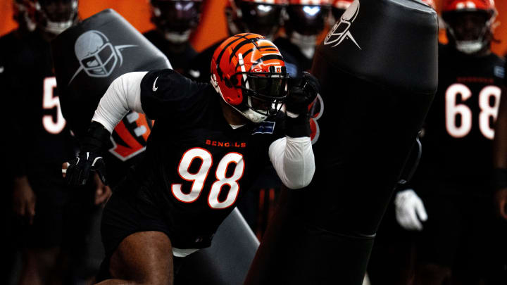 Cincinnati Bengals defensive tackle Sheldon Rankins (98) runs a drill at Bengals spring practice at the IEL Indoor Facility in Cincinnati on Wednesday, June 12, 2024.