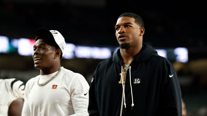 Cincinnati Bengals wide receiver Ja'Marr Chase (1) walks off the field with Cincinnati Bengals cornerback Cam Taylor-Britt (29) after the NFL preseason game at Paycor Stadium in Cincinnati on Thursday, Aug. 22, 2024.