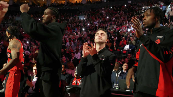 Oct 25, 2023; Toronto, Ontario, CAN; Toronto Raptors head coach Darko Rajakovic (center) claps during the player introductions before a game against Minnesota Timberwolves at Scotiabank Arena. Mandatory Credit: John E. Sokolowski-USA TODAY Sports