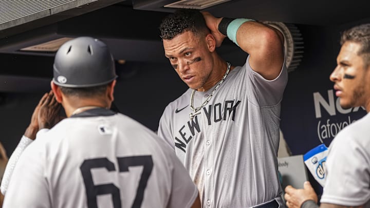 Jul 20, 2025; Cumberland, Georgia, USA; New York Yankees right fielder Aaron Judge (99) shown in the dugout during the game against the Atlanta Braves during the eighth inning at Truist Park. Mandatory Credit: Dale Zanine-Imagn Images