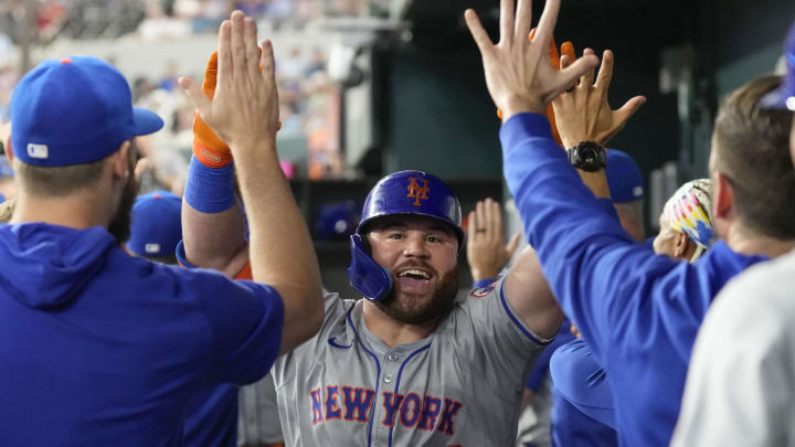 Jun 17, 2024; Arlington, Texas, USA; New York Mets right fielder DJ Stewart (29) celebrates his three-run home run with teammates in the dugout during the second inning against the Texas Rangers at Globe Life Field. Mandatory Credit: Jim Cowsert-USA TODAY Sports Jun 17, 2024; Arlington, Texas, USA; New York Mets right fielder DJ Stewart (29) celebrates his three-run home run with teammates in the dugout during the second inning against the Texas Rangers at Globe Life Field. Mandatory Credit: Jim Cowsert-USA TODAY Sports