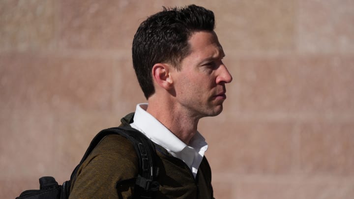 Mar 12, 2022; Mesa, AZ, USA; Chicago Cubs assistant general manager Craig Breslow arrives during a spring training workout at Sloan Park. Mandatory Credit: Joe Camporeale-USA TODAY Sports