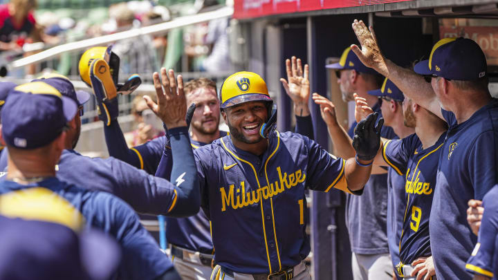 Aug 8, 2024; Cumberland, Georgia, USA; Milwaukee Brewers center fielder Jackson Chourio (11) reacts after hitting a home run against the Atlanta Braves during the fifth inning at Truist Park. Mandatory Credit: Dale Zanine-USA TODAY Sports