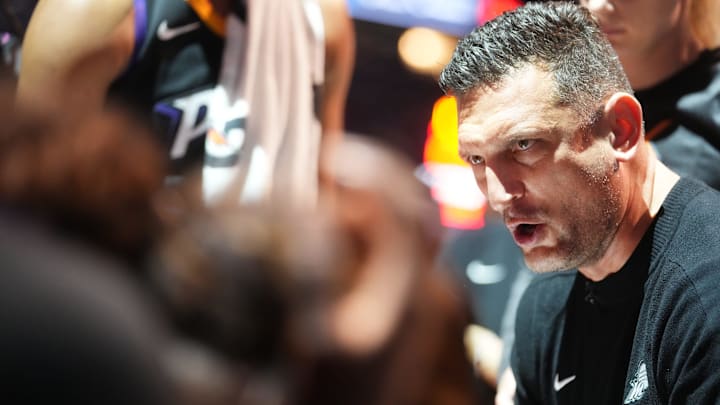 Phoenix Mercury head coach Nate Tibbetts talks to his team on the sidelines as they play the Minnesota Lynx during their WNBA semifinal playoff game at PHX Arena on Sept. 28, 2025.