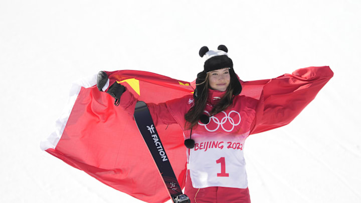 Eileen Gu celebrates winning gold in the women's freestyle skiing halfpipe final at the 2022 Beijing Olympics.