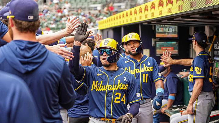 Jun 21, 2026; Cumberland, Georgia, USA; Milwaukee Brewers catcher William Contreras (24) reacts in the dugout after hitting a three run home run against the Atlanta Braves during the second inning at Truist Park. Mandatory Credit: Dale Zanine-Imagn Images